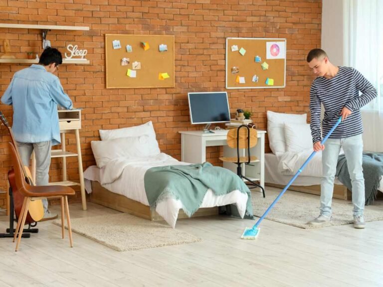 college boys cleaning their dorm room