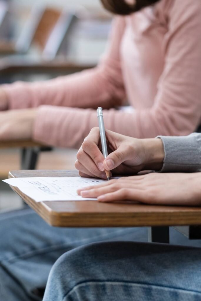 student taking an exam inside the exam room