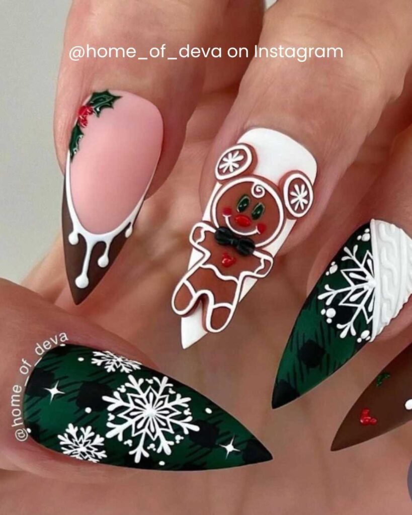 Festive nails featuring a 3D gingerbread man with green and chocolate brown tones, snowflakes, holly, and dripping icing accents.