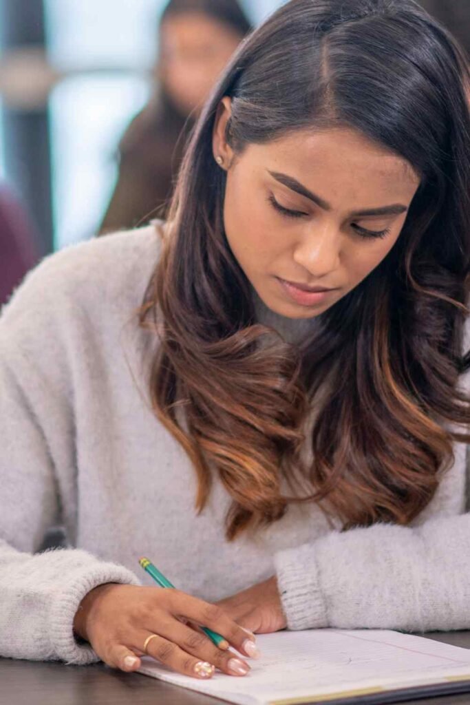 young brunette taking an exam in an exam room