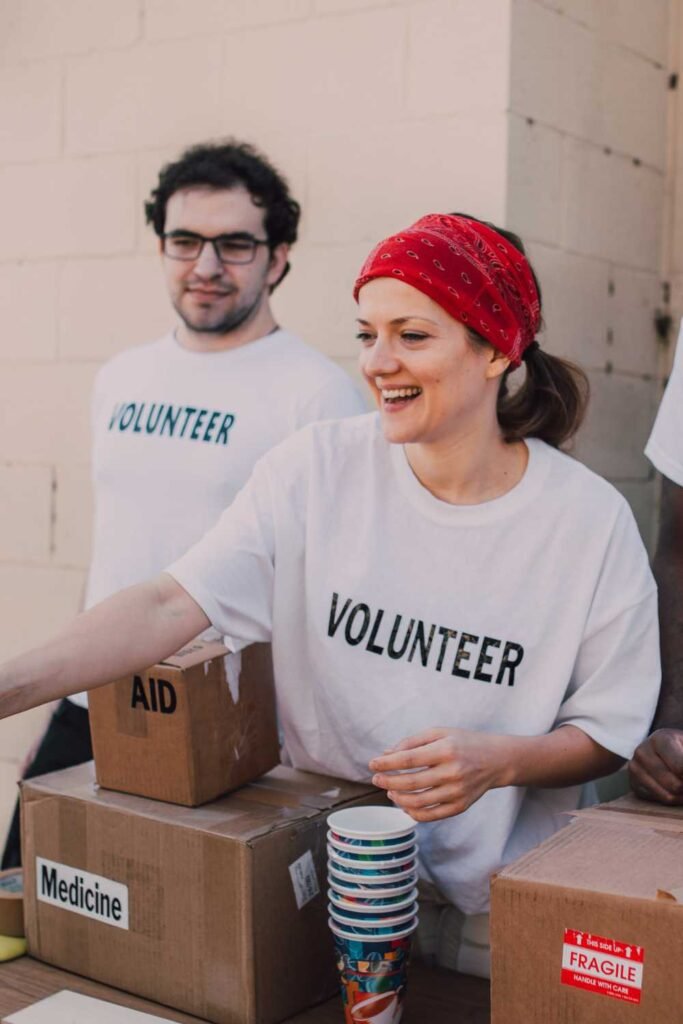young man and woman volunteering