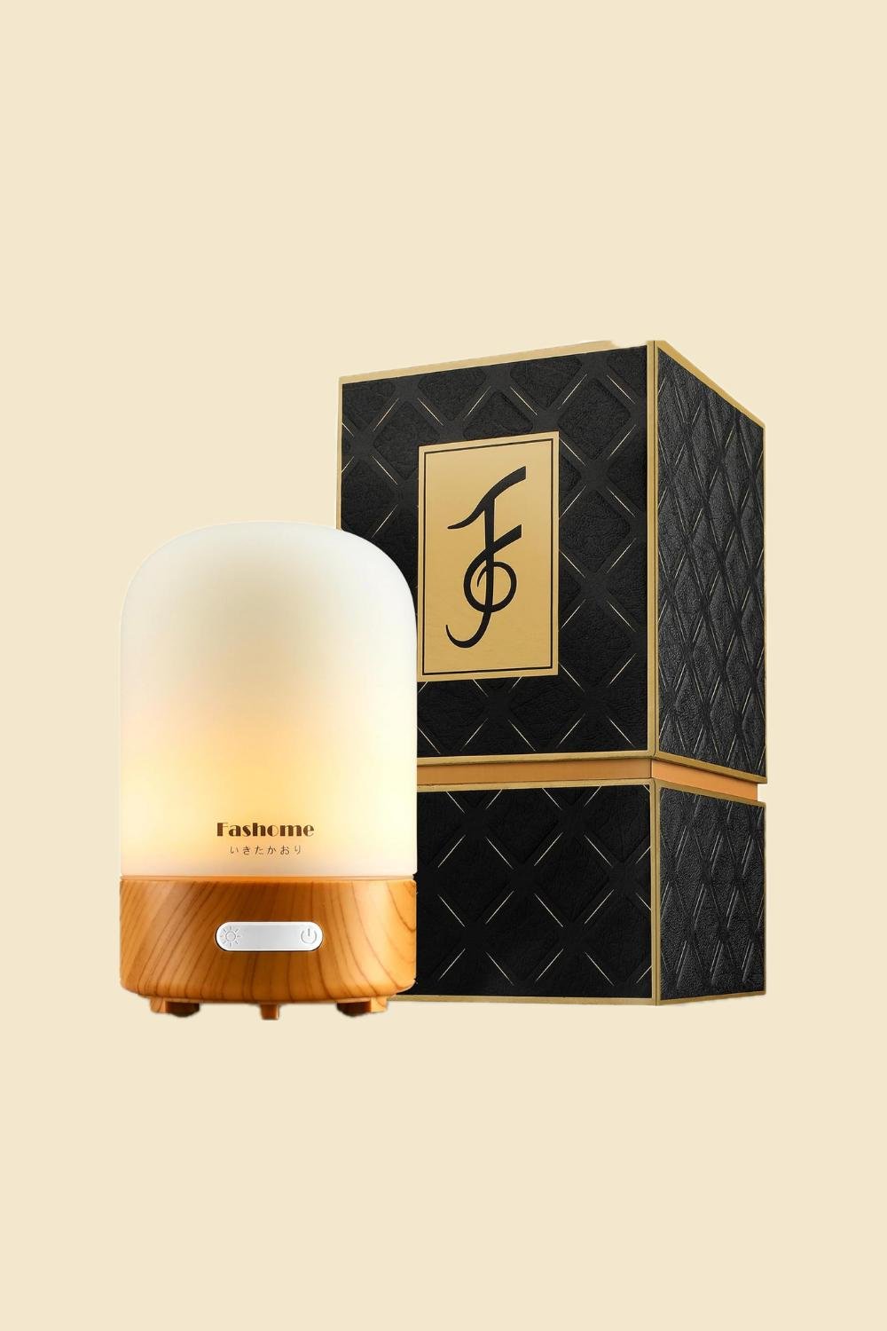 An aromatherapy diffuser with its box placed beside it.