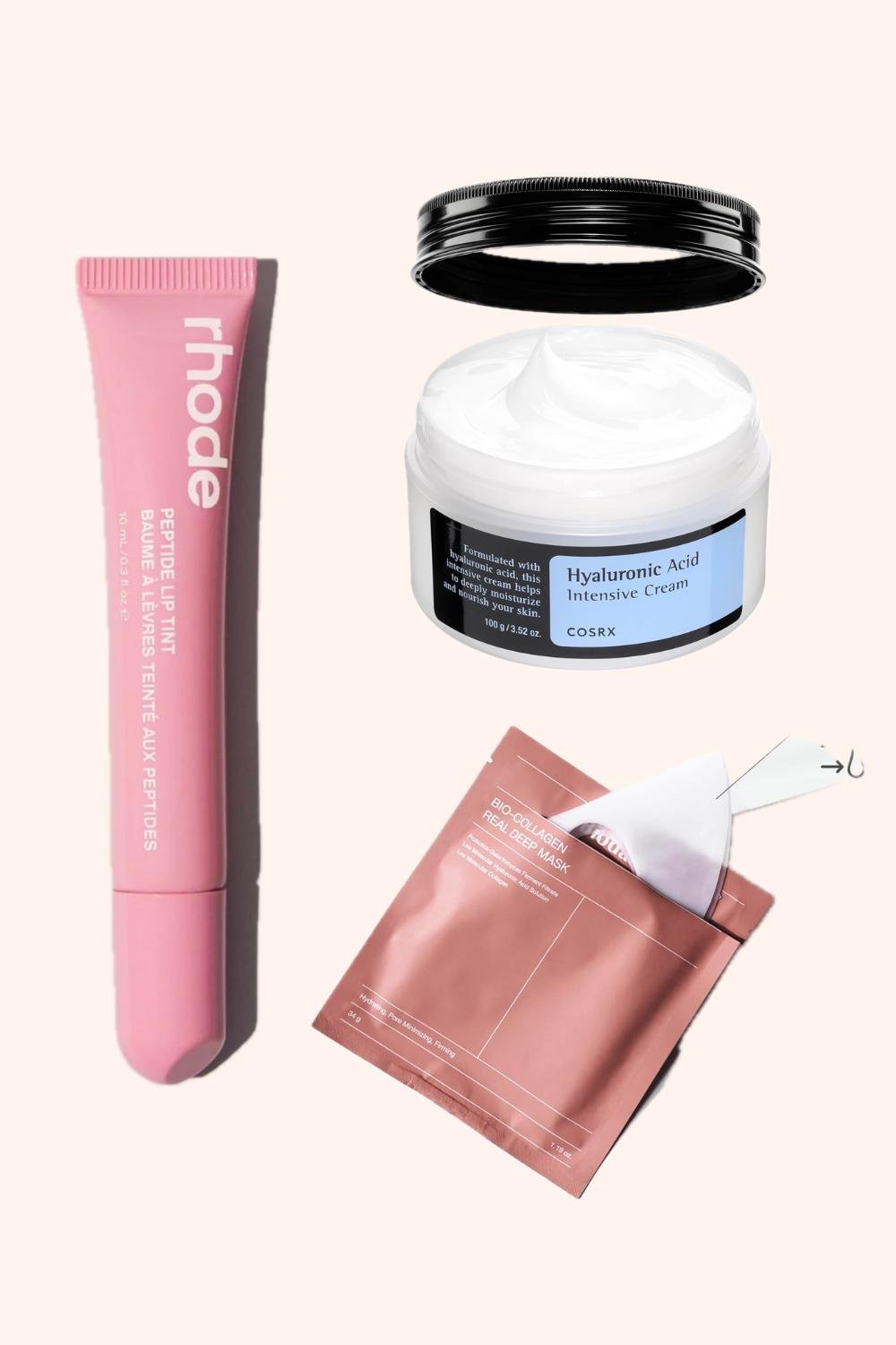 A lip balm, a moisturizer, and a face sheet mask arranged together.