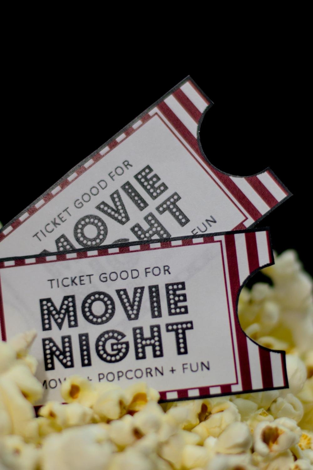 movie tickets with popcorn on the background 